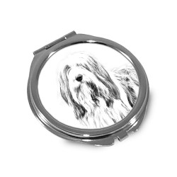 Bearded Collie- Taschenspiegel mit einem Bild eines Hundes.
