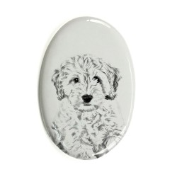 Cockapoo- Gravestone oval ceramic tile with an image of a dog.