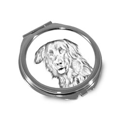Hovawart- Taschenspiegel mit einem Bild eines Hundes.