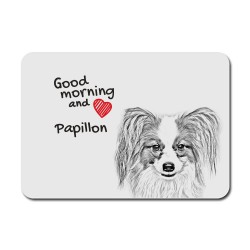 Papillon, A mouse pad with the image of a dog.