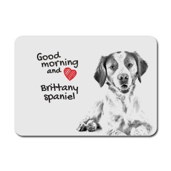Brittany spaniel, A mouse pad with the image of a dog.