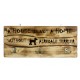 Wooden wall hanger with the picture of a dog and the words