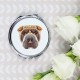 Pocket mirror with the image of a dog.