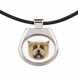 Un collier avec un chien Cairn Terrier. Une nouvelle collection avec le chien géométrique