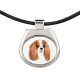 Un collar con un perro Cavalier King Charles Spaniel. Una nueva colección con el perro geométrico