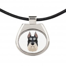 Un collier avec un chien Schnauzer cropped. Une nouvelle collection avec le chien géométrique