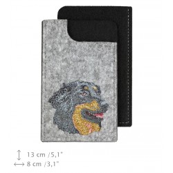 A felt phone case with an embroidered image of a dog.