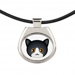 Un collar con un gato de Gato Manx. Una nueva colección con el lindo gato Art-Dog