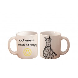 Doberman - kubek z wizerunkiem psa i napisem "... makes me happy". Wysokiej jakości kubek ceramiczny.