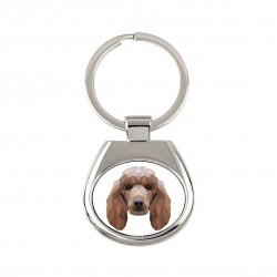 Key pendant with a Poodle dog. A new collection with the geometric dog