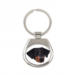 Key pendant with a Dobermann uncropped dog. A new collection with the geometric dog