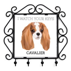 Un estante clave con Cavalier King Charles Spaniel, veo tus llaves. Una nueva colección con el perro geométrico