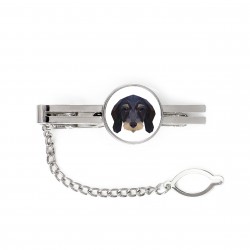A tie tack with Dachshund wirehaired dog. Men’s jewelry. A new collection with the geometric dog