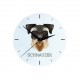 Une horloge avec un chien Schnauzer. Une nouvelle collection avec le chien géométrique
