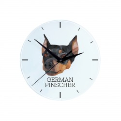 Un reloj con un perro Pinscher alemán. Una nueva colección con el perro geométrico