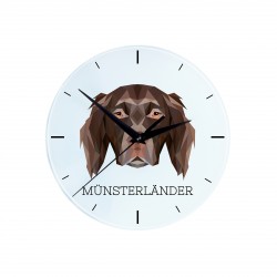 Un reloj con un perro Münsterländer pequeño. Una nueva colección con el perro geométrico