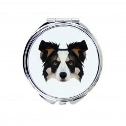 Un espejo de bolsillo con un perro Collie fronterizo. Una nueva colección con el perro geométrico