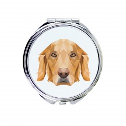 Un espejo de bolsillo con un perro Cobrador dorado. Una nueva colección con el perro geométrico