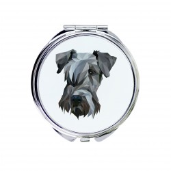 Uno specchio tascabile con un cane Cesky Terrier. Una nuova collezione con il cane geometrico