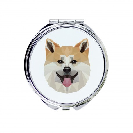 Espejo de bolsillo con una imagen de perro.