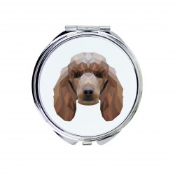 Uno specchio tascabile con un cane Barbone. Una nuova collezione con il cane geometrico