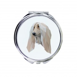 Un espejo de bolsillo con un perro Lebrel afgano. Una nueva colección con el perro geométrico
