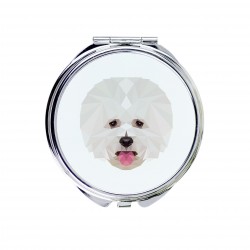 Un espejo de bolsillo con un perro Bichon frisé. Una nueva colección con el perro geométrico