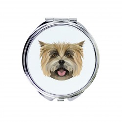 Un espejo de bolsillo con un perro Cairn Terrier. Una nueva colección con el perro geométrico