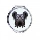 Uno specchio tascabile con un cane Skye Terrier. Una nuova collezione con il cane geometrico