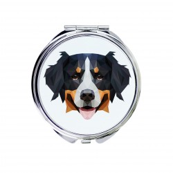 Uno specchio tascabile con un cane Bovaro del bernese. Una nuova collezione con il cane geometrico