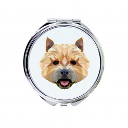 Un espejo de bolsillo con un perro Terrier de Norwich. Una nueva colección con el perro geométrico