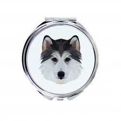 Un espejo de bolsillo con un perro Husky siberiano. Una nueva colección con el perro geométrico