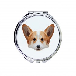 Un espejo de bolsillo con un perro Welsh corgi cardigan. Una nueva colección con el perro geométrico