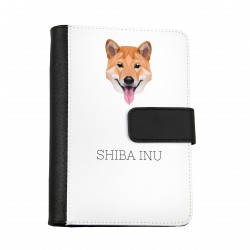 Cuaderno, libro con un perro Shiba Inu. Una nueva colección con el perro geométrico