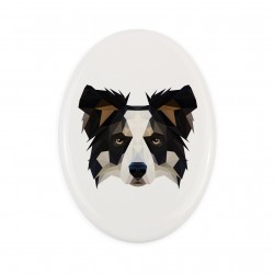 Una lapide in ceramica con un cane Border Collius. Cane geometrico