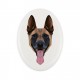 Lastra di ceramica ovale tombale con immagine del cane.