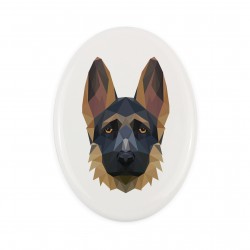 A ceramic tombstone plaque with a German Shepherd dog. Geometric dog