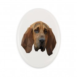 A ceramic tombstone plaque with a Bloodhound dog. Geometric dog