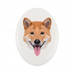 Una lapide in ceramica con un cane Shiba. Cane geometrico