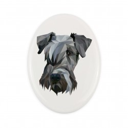 A ceramic tombstone plaque with a Cesky Terrier dog. Geometric dog