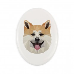 Una lapide in ceramica con un cane Akita. Cane geometrico