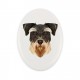 Una placa de cerámica con un perro Schnauzer. Perro geométrico.