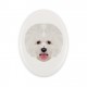 A ceramic tombstone plaque with a Bichon Frise dog. Geometric dog