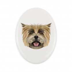 Una placa de cerámica con un perro Cairn Terrier. Perro geométrico.