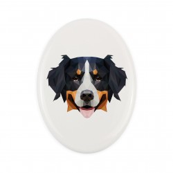 A ceramic tombstone plaque with a Bernese Mountain Dog dog. Geometric dog
