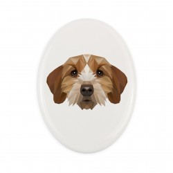 Una placa de cerámica con un perro Basset leonado de Bretaña. Perro geométrico.
