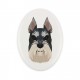 A ceramic tombstone plaque with a Schnauzer cropped dog. Geometric dog