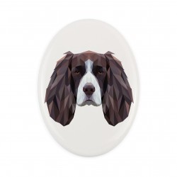 A ceramic tombstone plaque with a English Springer Spaniel dog. Geometric dog