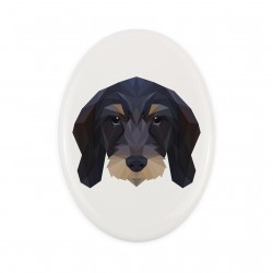 A ceramic tombstone plaque with a Dachshund wirehaired dog. Geometric dog