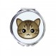 Un espejo de bolsillo con gato. Una nueva colección con el lindo gato Art-dog